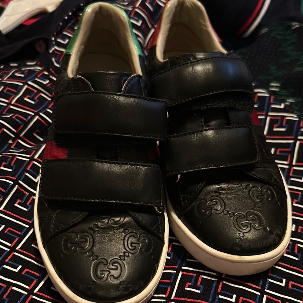 Gucci Kids Black Sneakers with Embossed Logo